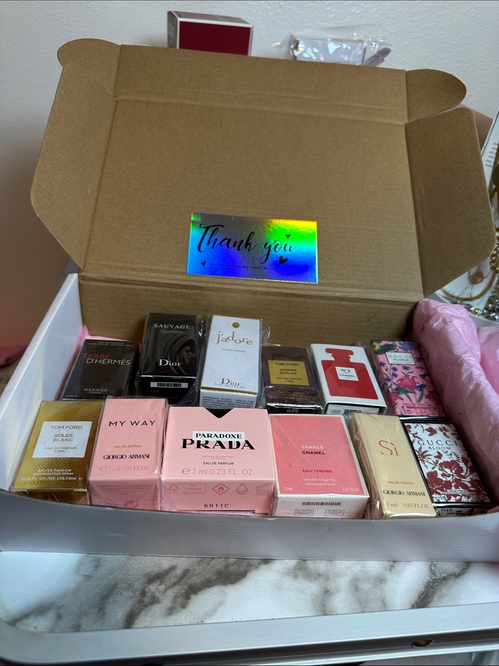 Random Luxury Women’s Fragrance Mini Set of 12 pieces. Sizes 5,7,7.5 mL